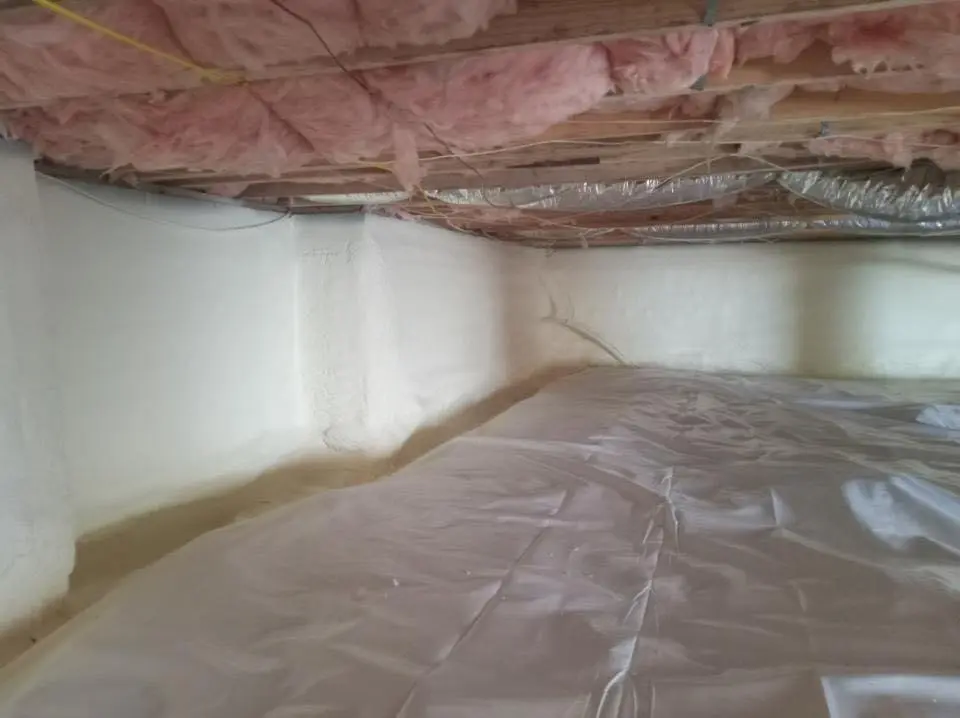 Crawl space encapsulation with closed-cell spray foam for Commercial Roof Restoration in Cornelius